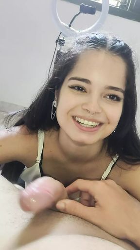 This young Debora Prado gives me a blowjob while messing with the cell phone