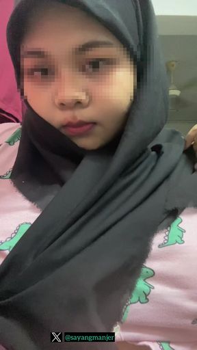 Hijabi malay sucking dildo